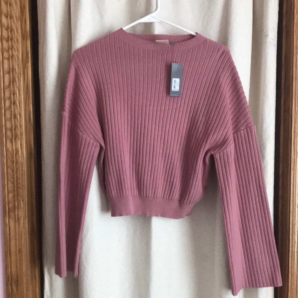 XS pink slightly cropped long sleeve shirt.